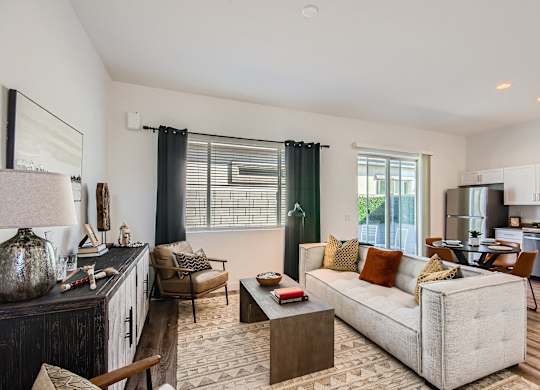 Living room and kitchen with wood flooring at Hampton Meridian, Apache Junction, 85120