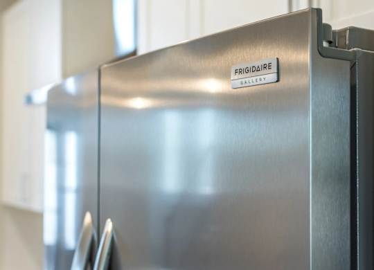 Refrigerator at Dolce Villagio Townhomes, Tempe, AZ