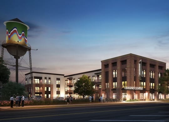 a rendering of a brick building with a water tower at Link Apartments® Broad Ave, Memphis