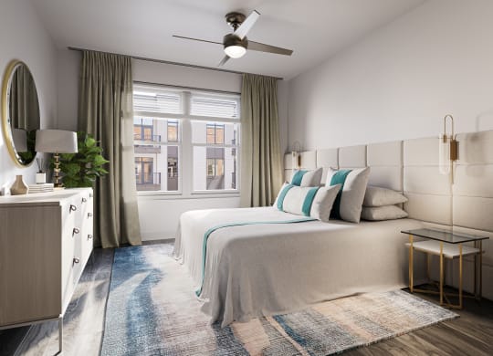 a bedroom with a bed and a window at Link Apartments® Broad Ave, Memphis, Tennessee