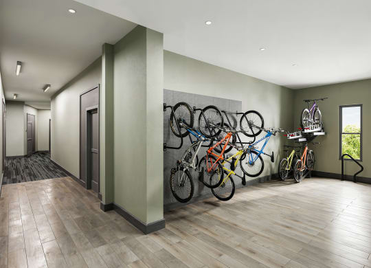 a row of bikes on a wall in a room at Link Apartments® CYKEL Apartments, Charlotte , NC 28208