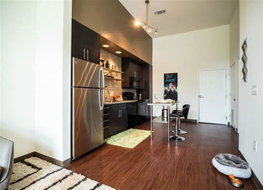 Stainless Steel & Black Appliances In The Kitchen at Link Apartments® Canvas, Atlanta, 30312