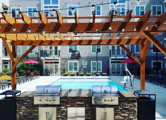 Poolside Sundeck And Grilling Area at Link Apartments® Brookstown, Winston Salem, NC, 27101