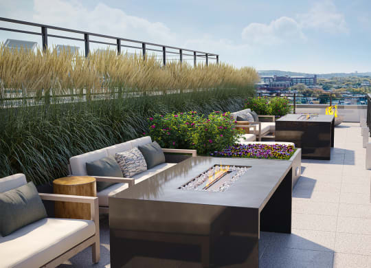 a roof top lounge with a view of the city at Link Apartments® H Street, Washington, Washington