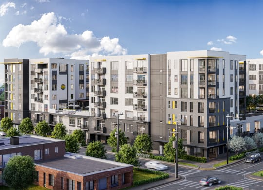 a rendering of an apartment complex on a city street at Link Apartments® Mint Street, North Carolina