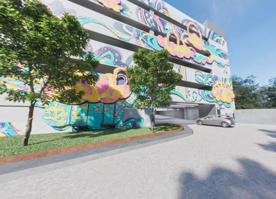 a rendering of a building with a colorful mural on the side of it at Link Apartments NoDa 36th, Charlotte