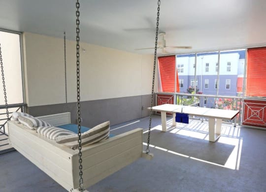 Unique porches and ping pong tables in Phase 1 at Link Apartments® Mixson, North Charleston, SC