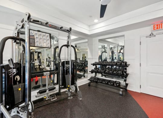 the gym is equipped with weights and cardio equipment at Link Apartments® Brookstown, Winston Salem, 27101
