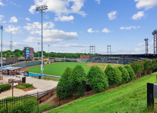a view of a baseball field at a stadium at Link Apartments® Brookstown, North Carolina