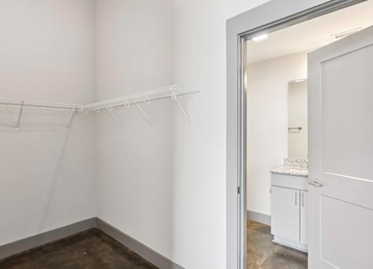Closet connected to bathroom in Converse Mill Lofts in Spartanburg, SC.