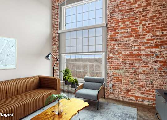 Virtually staged living room in Converse Mill Lofts in Spartanburg, SC