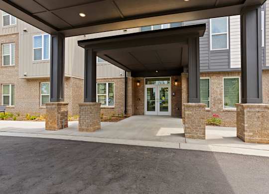 Ovata at Reedy Creek Senior Apartments in Charlotte NC covered entry drive