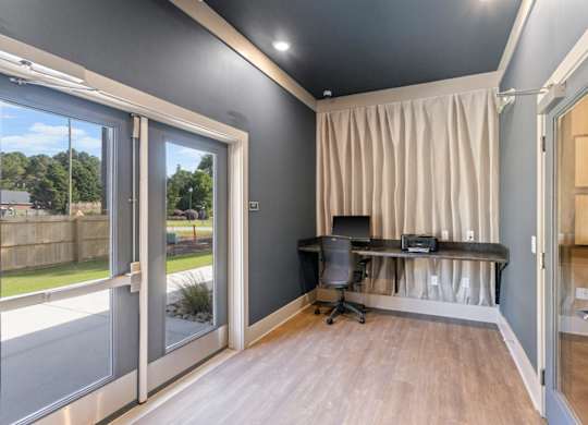 Peaks of Lexington Business Center in Clubhouse with Computer, printer, and curtain