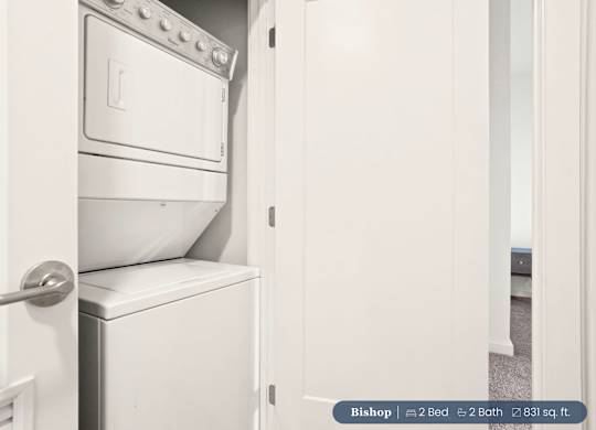 A white oven and toilet are in a small room.