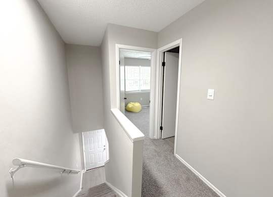 Reserve at Hillcrest Townhomes upstairs furnished apartment with bathroom and bedroom