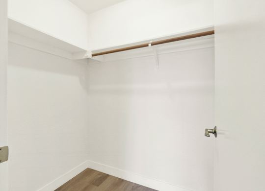 A white door with a silver handle is on the right side of the image at Twelve One Ten Rochester, Los Angeles, 90025