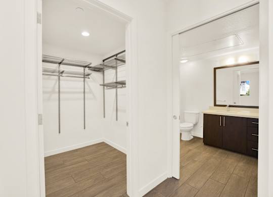 A bathroom with a walk-in shower and a toilet at The Urbanpolitan, Los Angeles, CA 90036