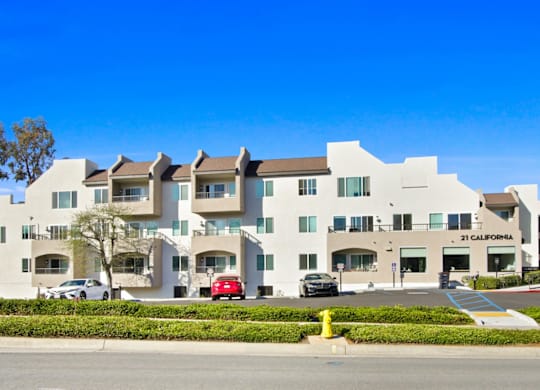 A white building with the words "21 California" on the front.