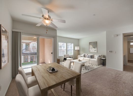 Living room with a ceiling fan and dining room at Monarch at Dos Vientos Newbury Park, CA 91320