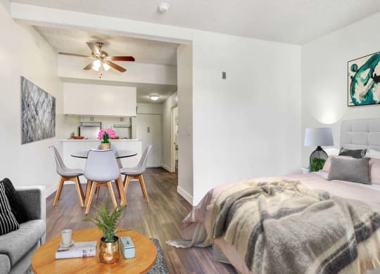 a bedroom with a bed and a ceiling fan  at Sherway Villa, Reseda, CA