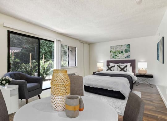 a bedroom with a table and chairs and a bed  at Sherway Villa, California, 91335