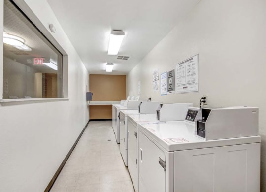 a washer and dryer in a room  at Sherway Villa, Reseda, 91335