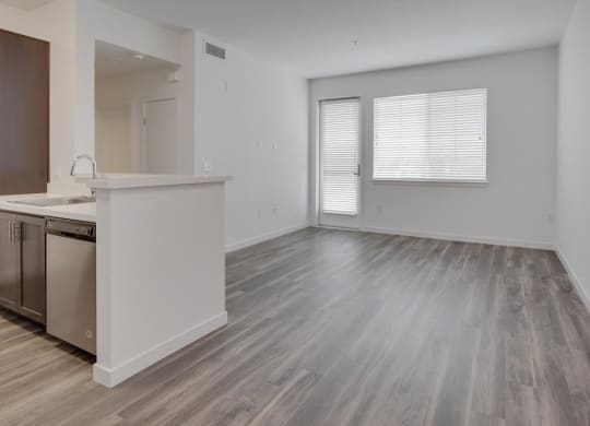 living room with a kitchen at Deer Creek Apartments, San Ramon