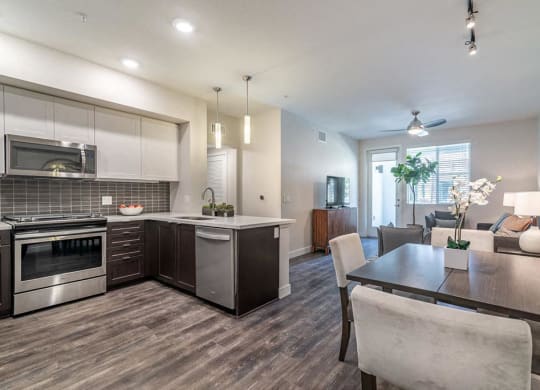 Kitchen and dining at Montecito Apartments at Carlsbad, Carlsbad, CA