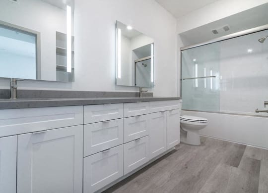 Bathroom with cabinets at Montecito Apartments at Carlsbad, California, 92010