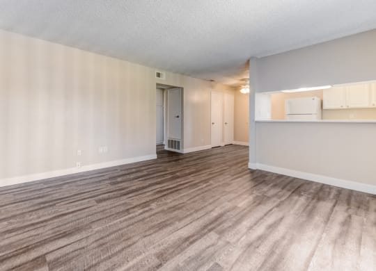 Spacious living room and dining room at Redlands Park Apts, Redlands, CA