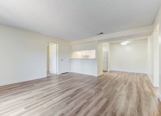 Spacious living room and a kitchen at Redlands Park Apts, Redlands, California
