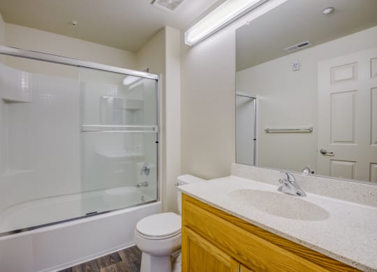 a bathroom with a toilet sink and shower  at Seville at Gale Ranch, San Ramon, CA