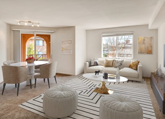 a living room with a white couch and a white coffee table with two ottomans  at Falcon Bridge at Gale Ranch, San Ramon, 94582