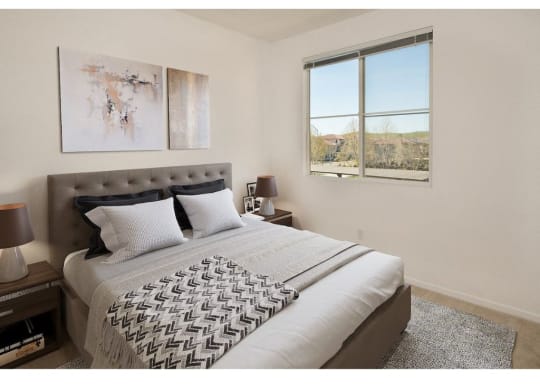 a bedroom with a large bed and a large window  at Seville at Gale Ranch, California, 94582