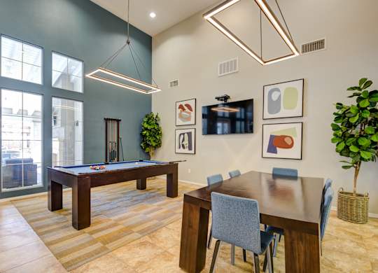 Community room with a pool table and a dining table at Sonoma at Porter Ranch, CA, 91326
