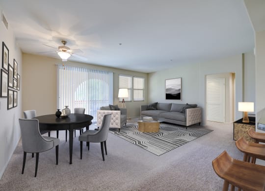 a living room with a table and chairs and a couch  at Sonoma at Porter Ranch, Porter Ranch, CA, 91326