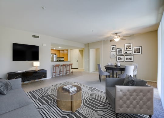 a living room with a couch and a chair  at Sonoma at Porter Ranch, Porter Ranch