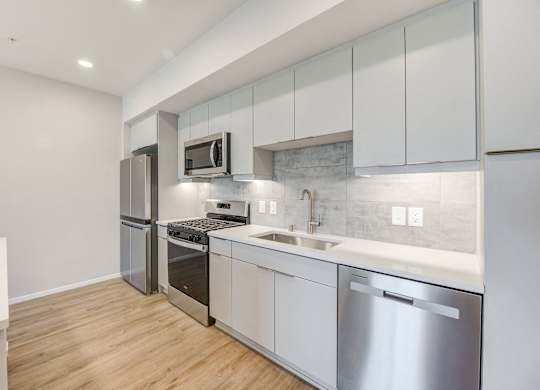 Kitchen with stainless steel appliances at The Overlook Santa Clarita, CA 91350