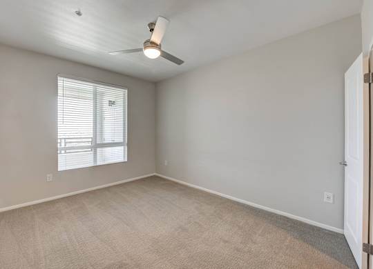 Guest Bedroom with ceiling fan at The Overlook Santa Clarita, CA 91350