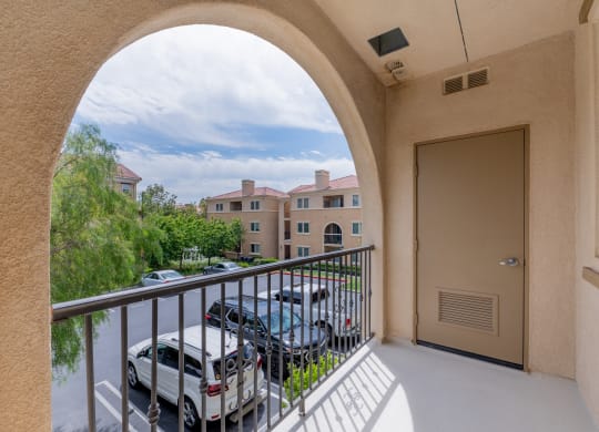 a balcony with a view of a parking lot  at Ventana Senior Apartments, Northridge, CA, 91326