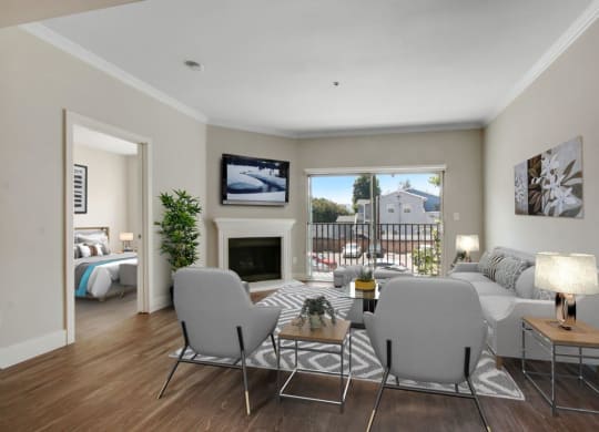a living room with a couch and two chairs in front of a fireplace 1 at Toluca Court, California, 91602