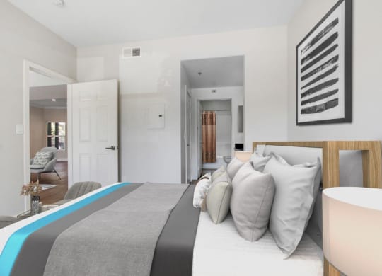 a bedroom with a bed and a chair in a room at Toluca Court, Toluca Lake, California