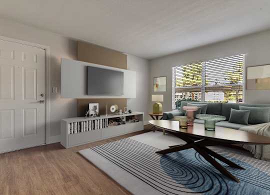 A modern living room with a wooden floor and a large window.