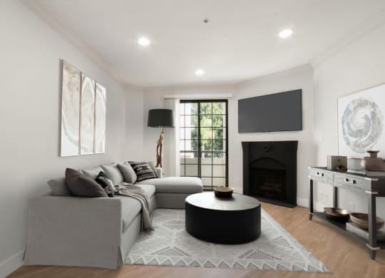a living room with a couch and a table at Burton, Los Angeles, CA