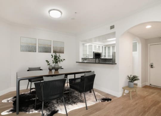 a dining room with a table and chairs at Burton, Los Angeles, California