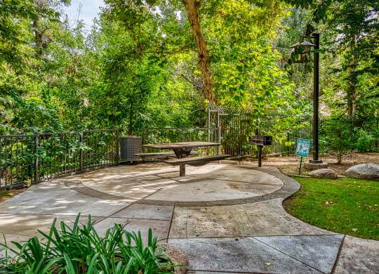 a picnic table in a park with trees at Canyon Crest, Riverside, CA