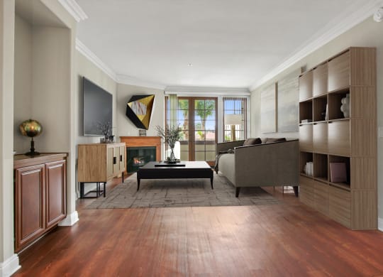 a living room with a couch and a coffee table at Darlington Apartments, Los Angeles