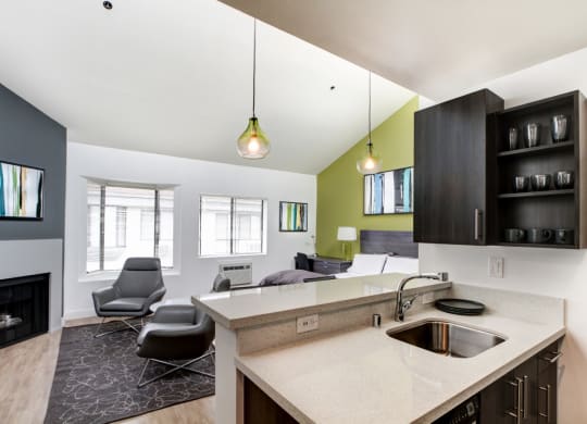 a kitchen and living room in a 555 waverly unit  at El Greco Lofts, Los Angeles