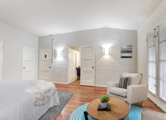 a bedroom with a bed and a chair  at 1022 Tiverton, Los Angeles, California