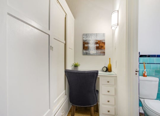 a small desk in a bathroom next to a toilet  at 1022 Tiverton, Los Angeles, 90024